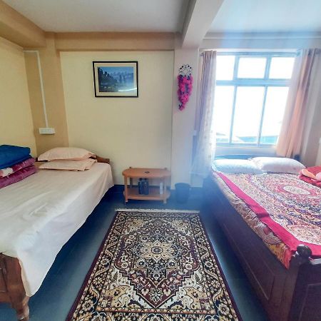 דרג'ילינג Neora Backpackers Hostel מראה חיצוני תמונה
